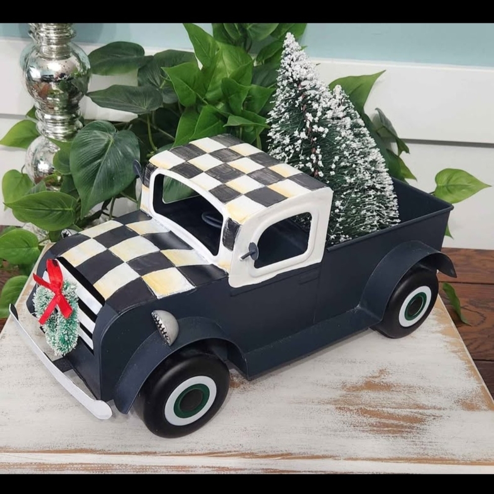 Checkered Black and White Decorative Truck with Trees